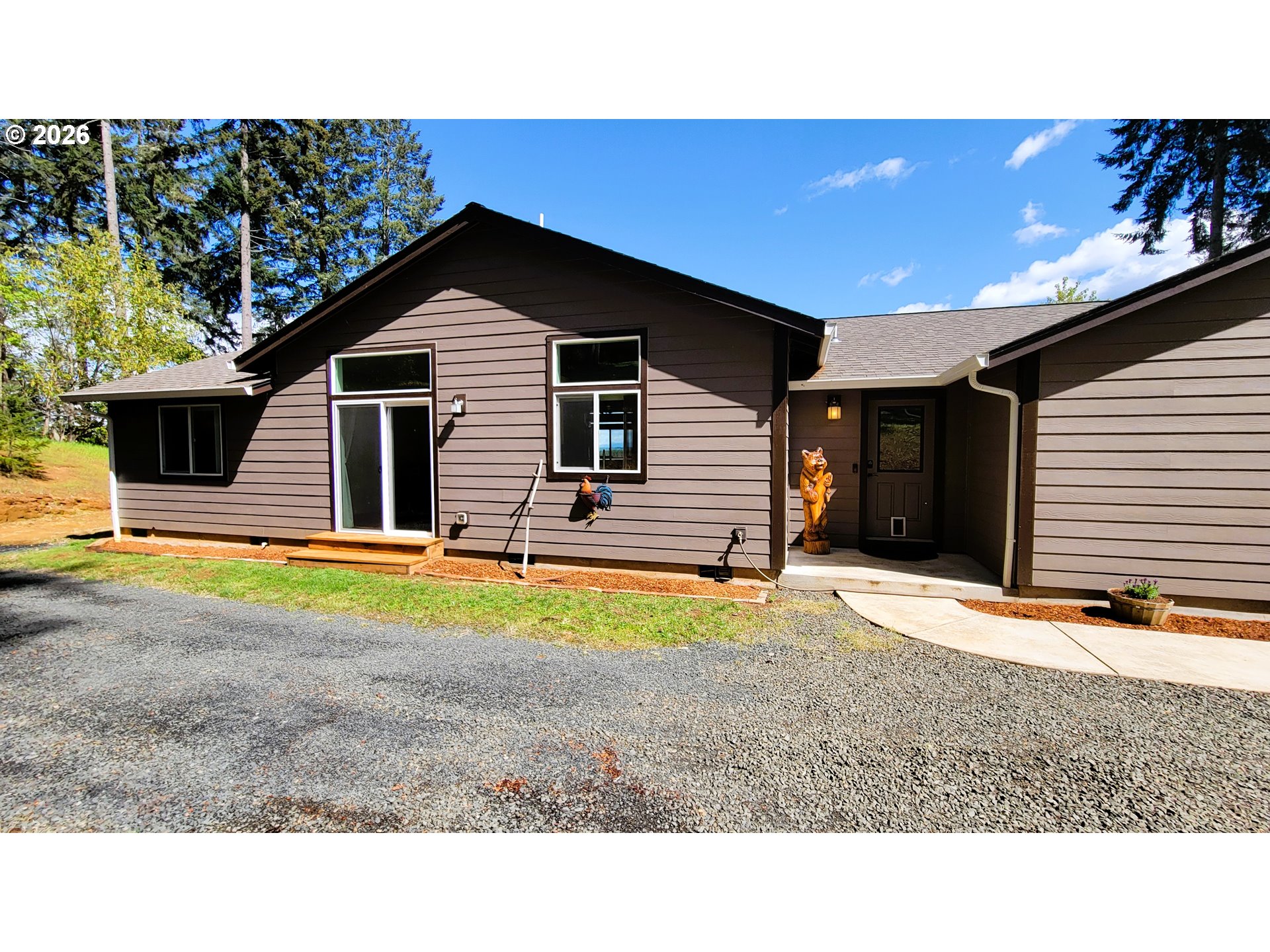 24674 Bolton Hill Road Veneta, OR 97487 - Photo 24 of 35 a house view with a backyard space