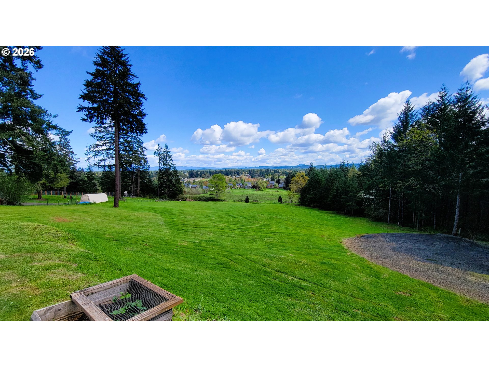 24674 Bolton Hill Road Veneta, OR 97487 - Photo 32 of 35 a backyard of a house with lots of green space