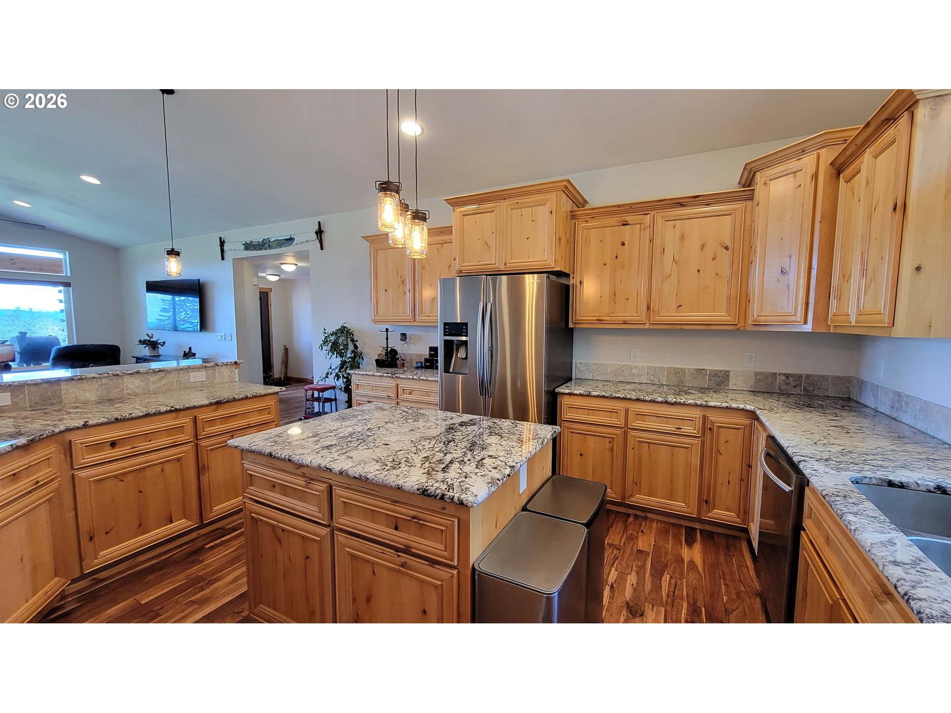 24674 Bolton Hill Road Veneta, OR 97487 - Photo 7 of 35 a kitchen with a sink refrigerator and microwave