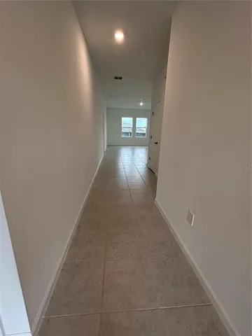 a view of hallway with stairs