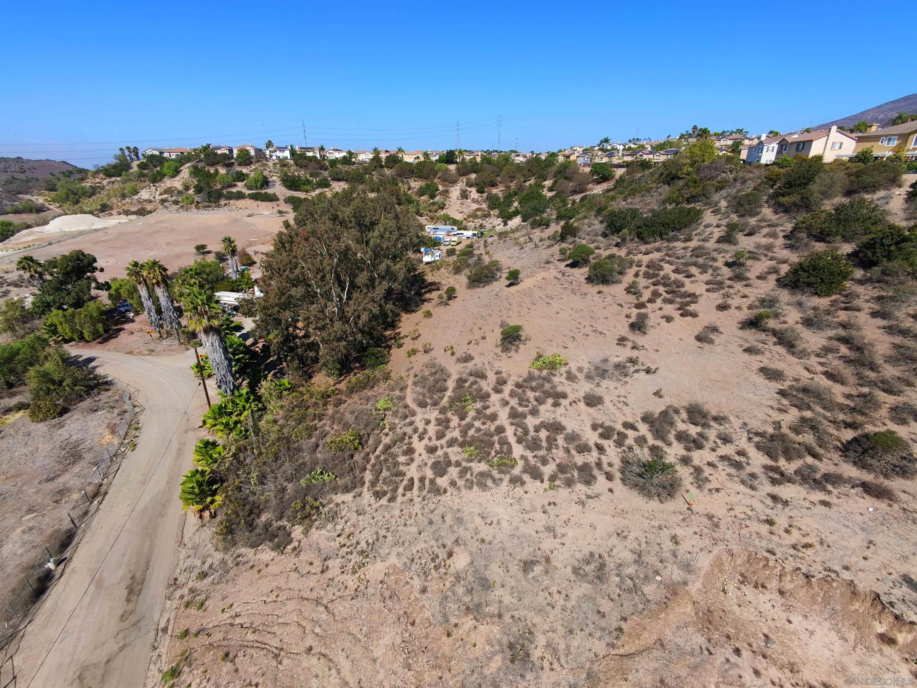 9970 Proctor Valley Road, Unit 3 Chula Vista, CA 91914 - Photo 6 of 9 a view of a beach with mountains in the background