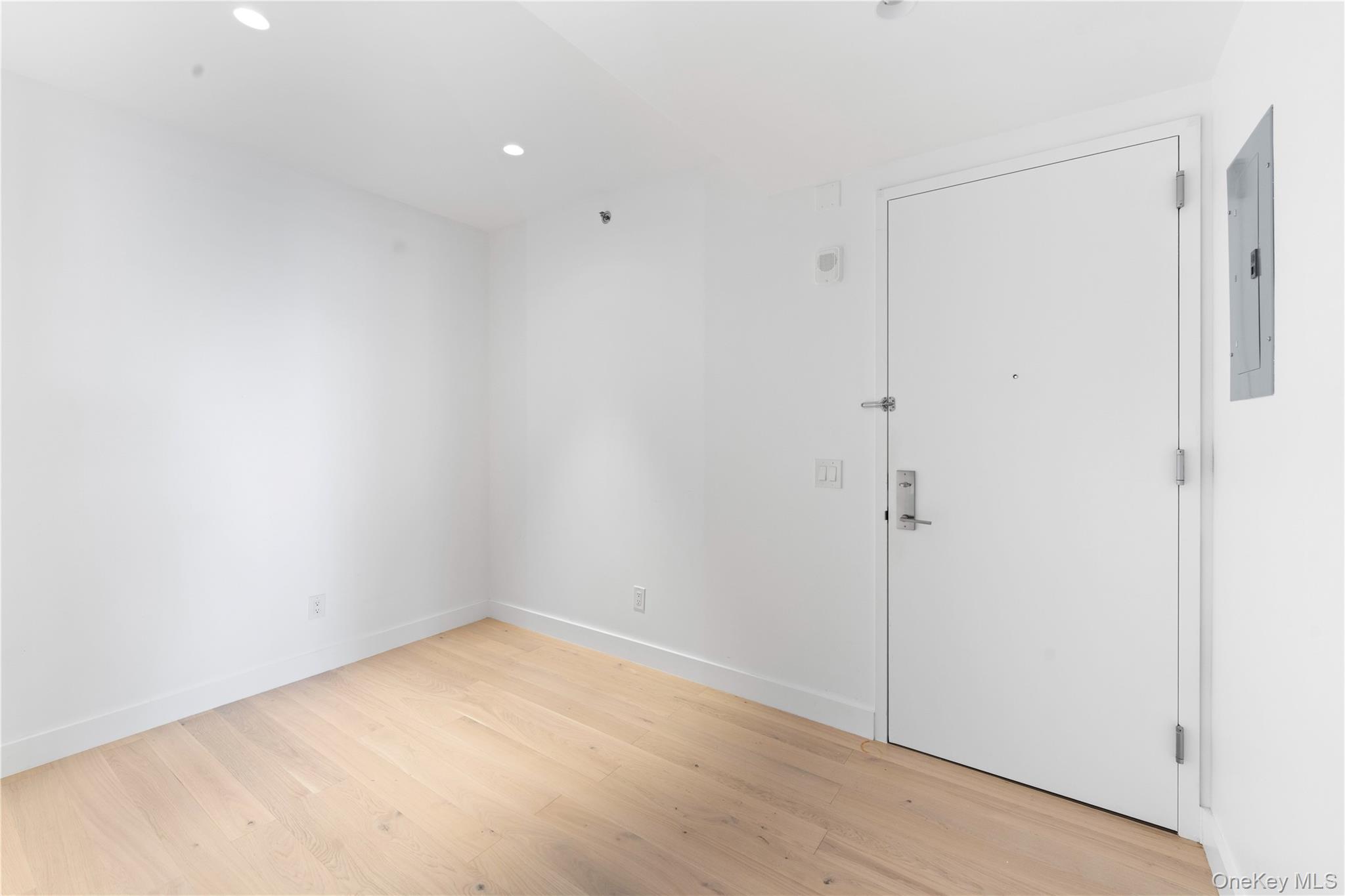 136-18 Maple Avenue, Unit 5G Queens, NY 11355 - Photo 12 of 35 a view of an empty room