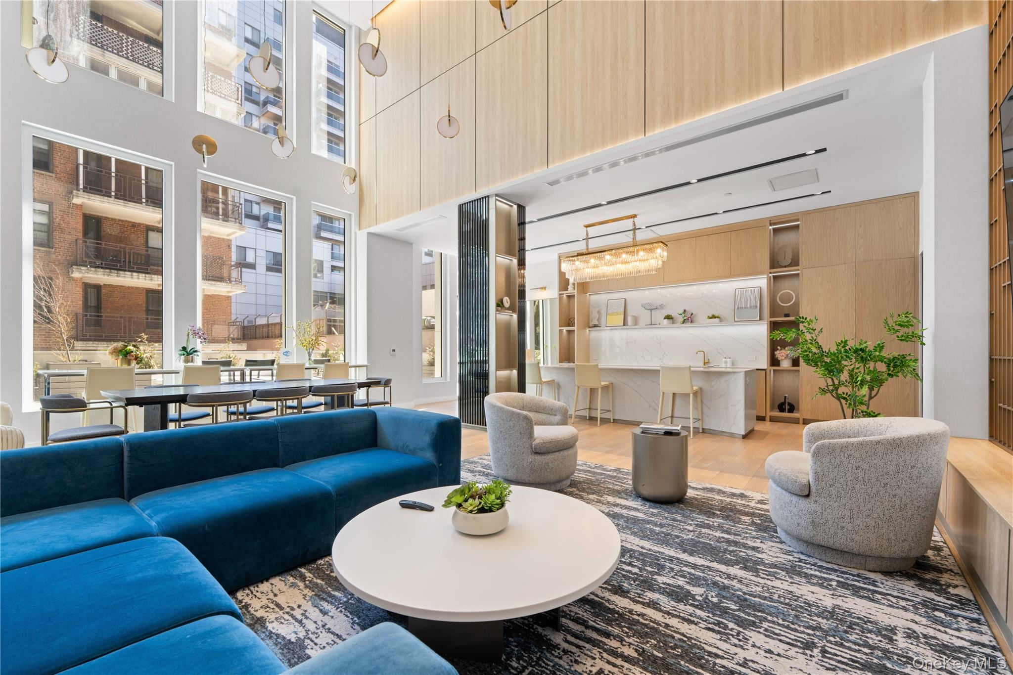 136-18 Maple Avenue, Unit 5G Queens, NY 11355 - Photo 19 of 35 a living room with furniture and a large window