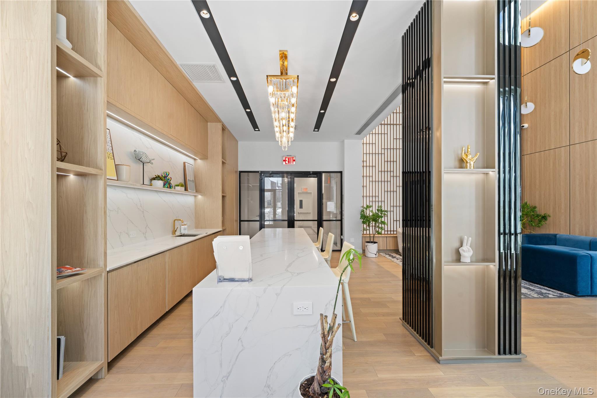 136-18 Maple Avenue, Unit 5G Queens, NY 11355 - Photo 22 of 35 a view of entryway and hall with wooden floor