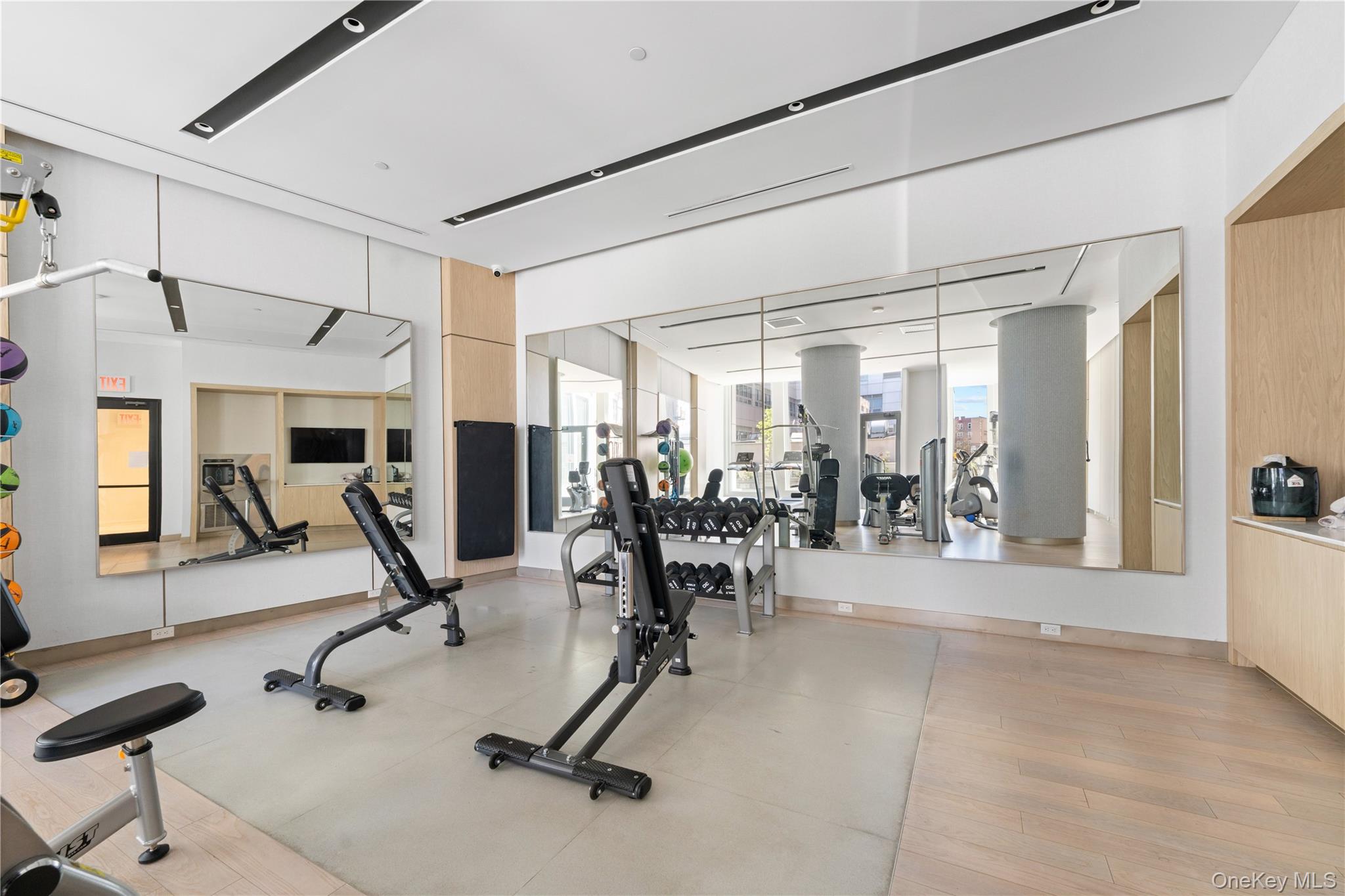 136-18 Maple Avenue, Unit 5G Queens, NY 11355 - Photo 30 of 35 a view of a room with gym equipment