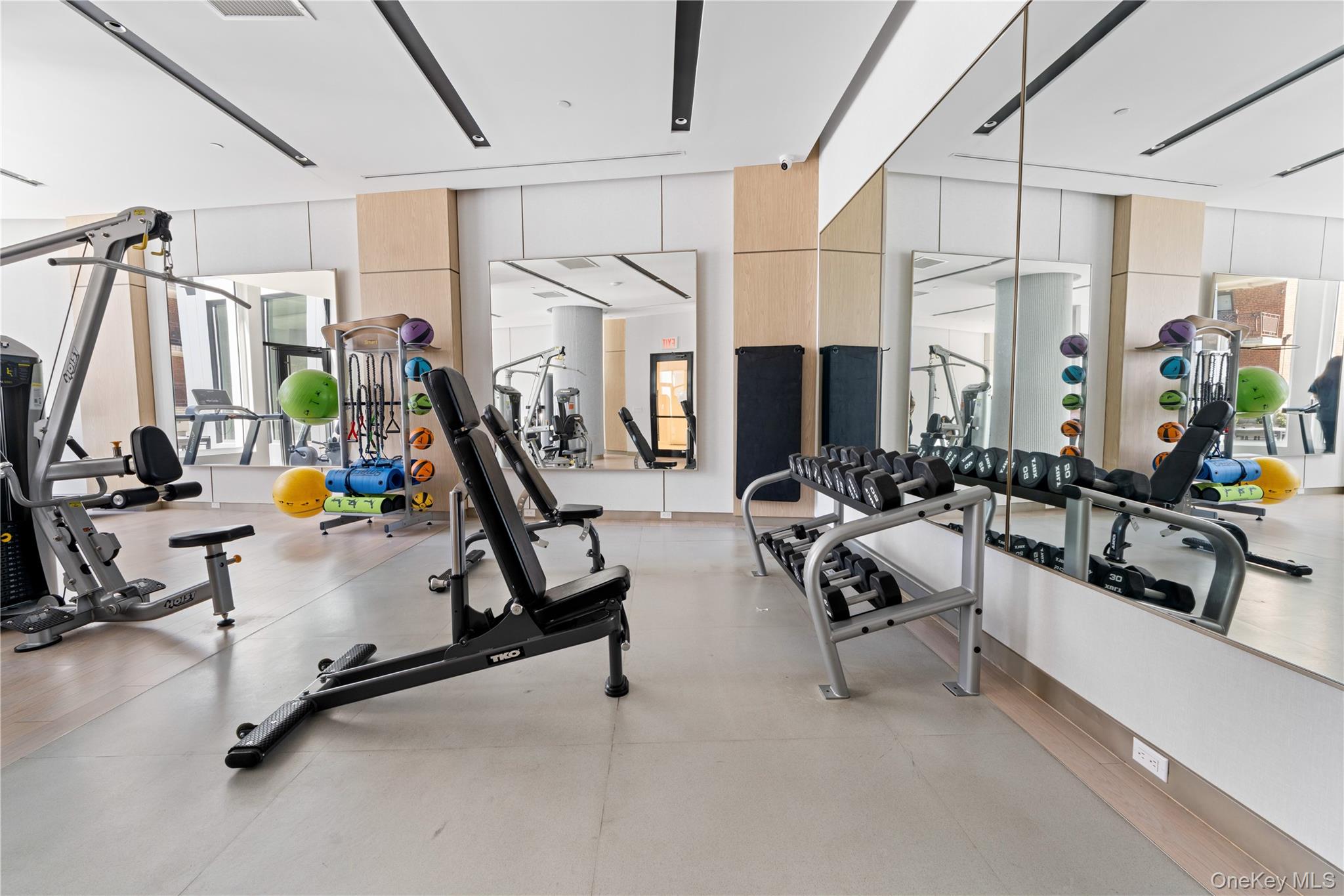 136-18 Maple Avenue, Unit 5G Queens, NY 11355 - Photo 31 of 35 a view of a room with gym equipment