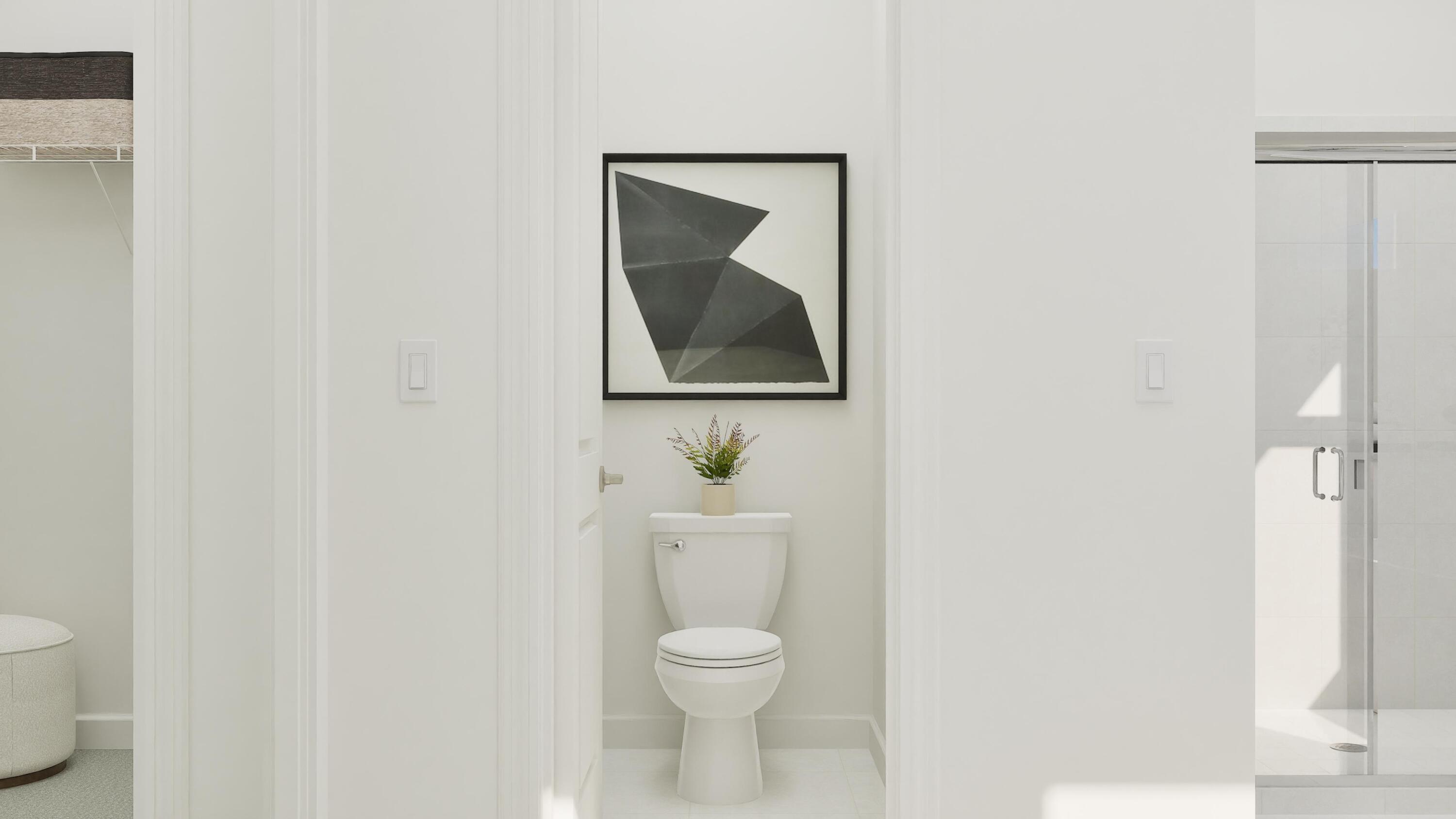 1024 Raleigh Way Wellington, FL 33449 - Photo 22 of 25 a white toilet sitting next to a white sink and vanity