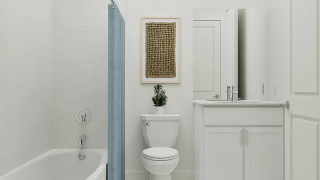 a bathroom with a sink a toilet and a bathtub