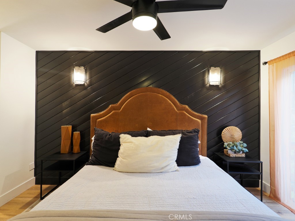 28596 North Bay Road Lake Arrowhead, CA 92352 - Photo 51 of 69 a bedroom with a bed and dresser