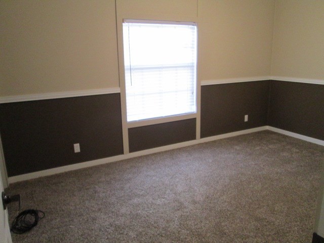 180 Davis Road Gray, GA 31032 - Photo 14 of 29 an empty room with a window