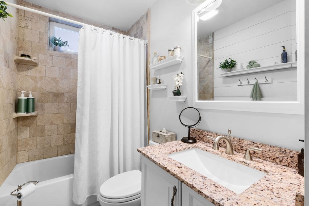 344 Anthony Street Fall River, MA 02721 - Photo 14 of 40 a bathroom with a granite countertop sink toilet and shower