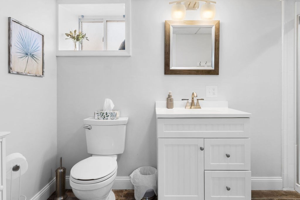 344 Anthony Street Fall River, MA 02721 - Photo 30 of 40 a bathroom with a toilet a sink and mirror