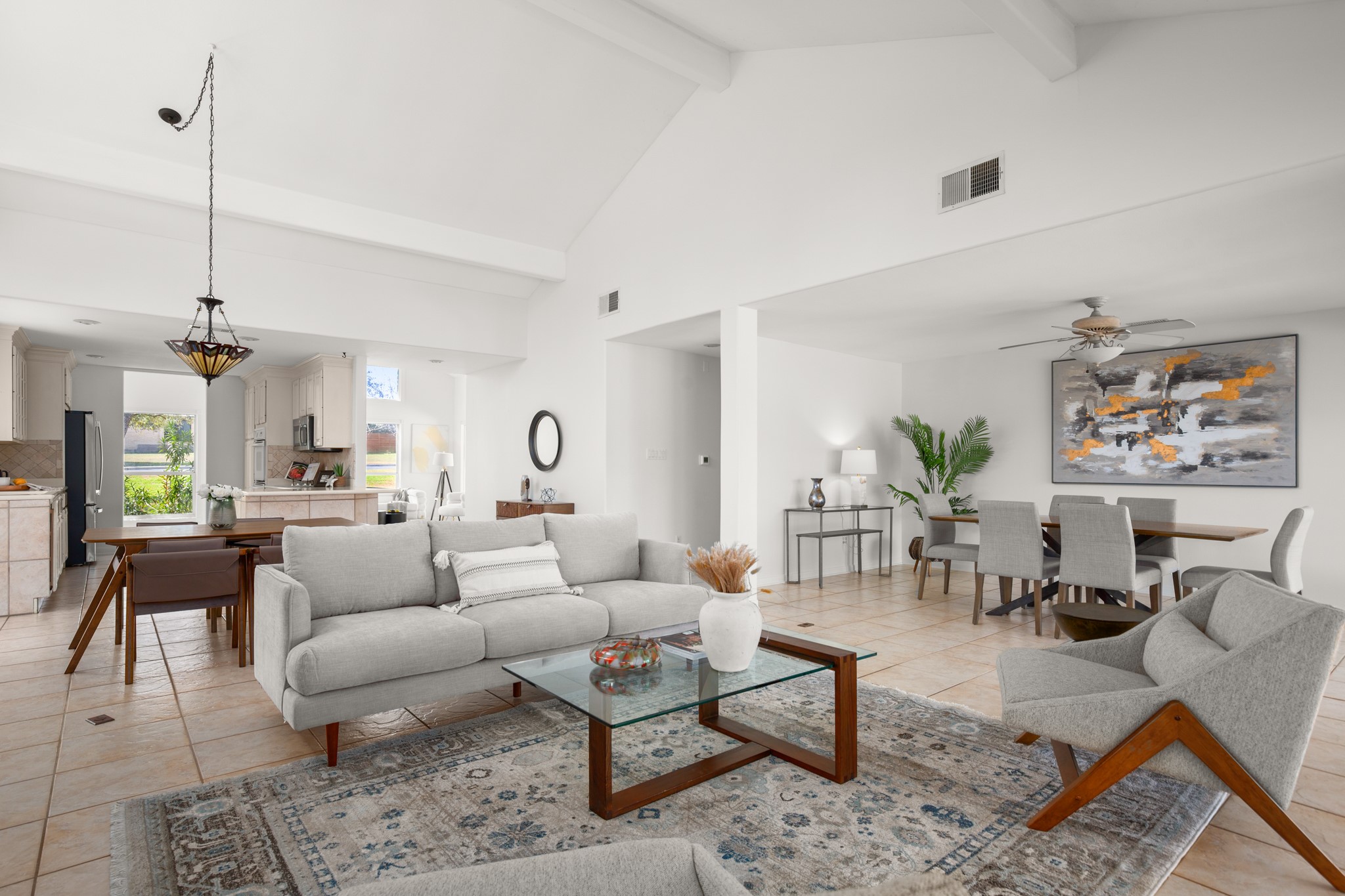 209 Ridgecrest Road Georgetown, TX 78628 - Photo 14 of 40 The main living area offers seamless connectivity between the formal dining room, family room, second dining area, and kitchen.