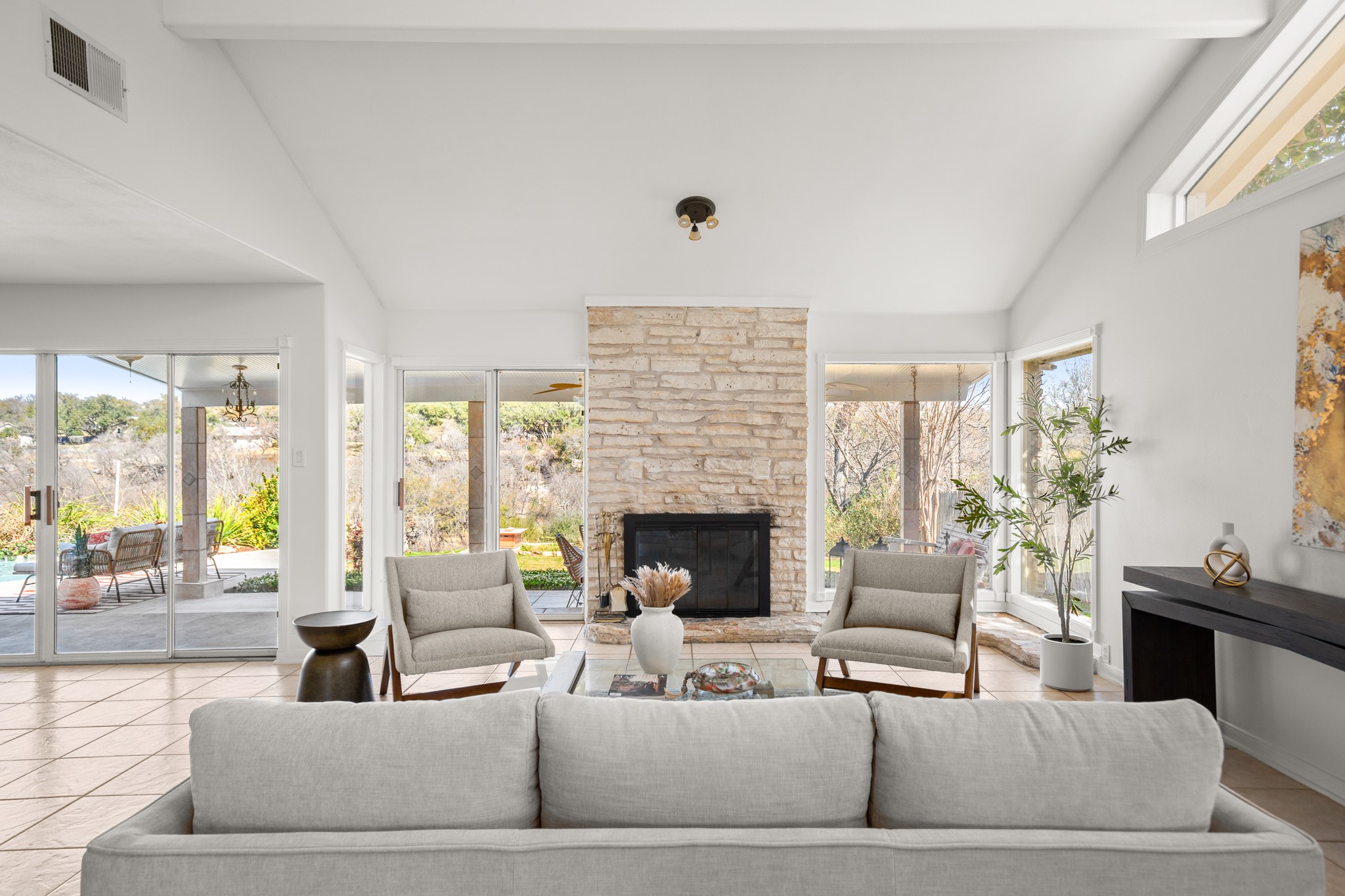 209 Ridgecrest Road Georgetown, TX 78628 - Photo 15 of 40 The family room is warm and welcoming, framed around a striking wood-burning fireplace nestled in a stone hearth.