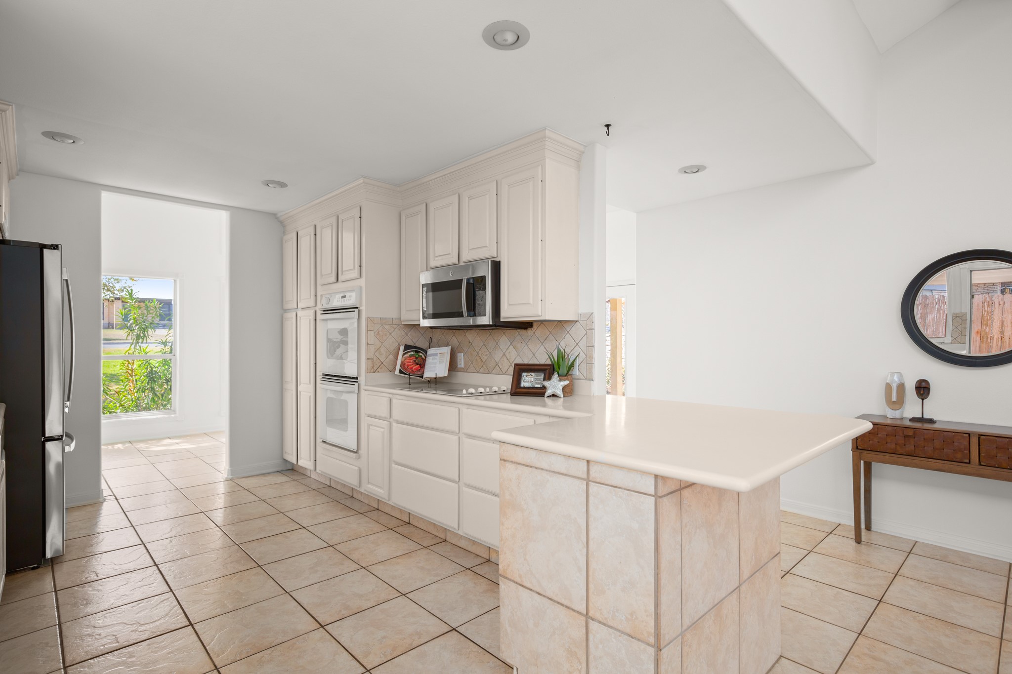 209 Ridgecrest Road Georgetown, TX 78628 - Photo 19 of 40 The kitchen comes ready to use with room for modern upgrades at your own pace.