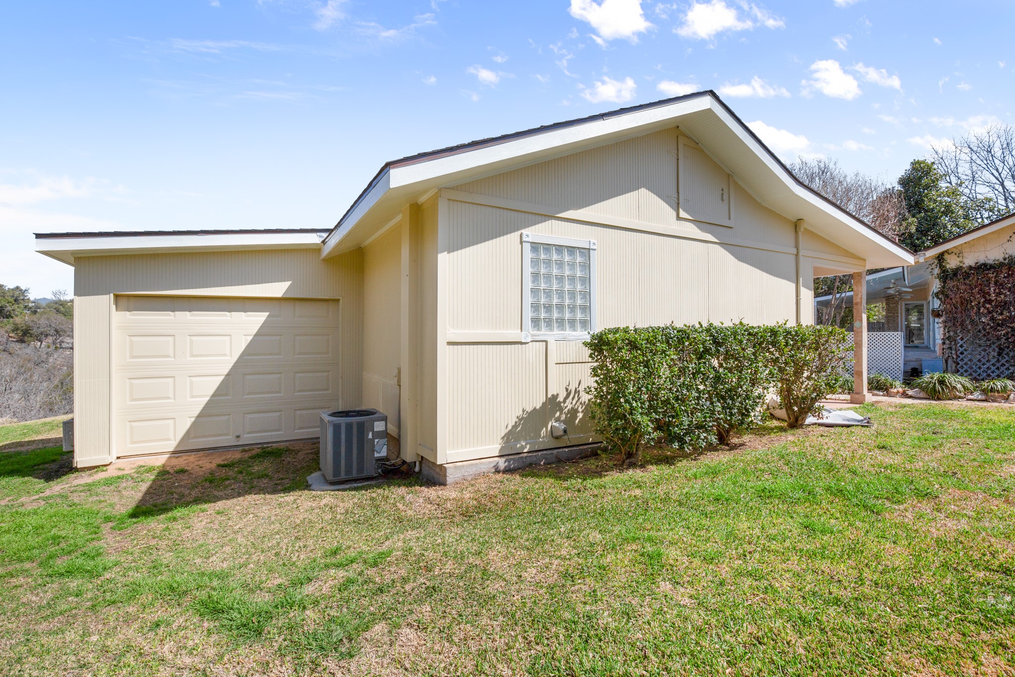 209 Ridgecrest Road Georgetown, TX 78628 - Photo 37 of 40 On the back of the casita is a storage area with room for a lawn mower and golf cart.