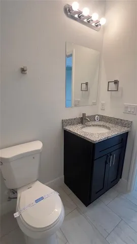 a bathroom with a sink and a toilet