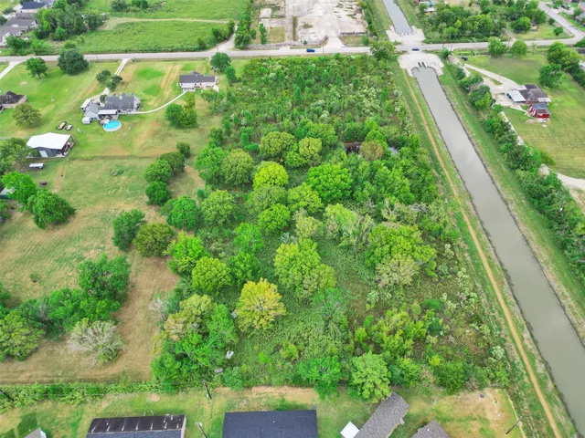 a view of a garden with a lake view