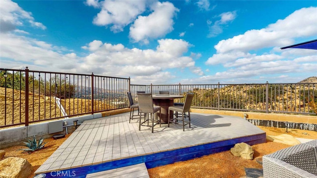 7300 Santa Susana Pass Road Simi Valley, CA 93063 - Photo 11 of 34 a view of a balcony with lake view and a potted plant