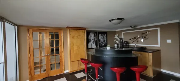 a living room with furniture and a rug