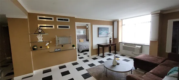 a kitchen with a sink and a refrigerator