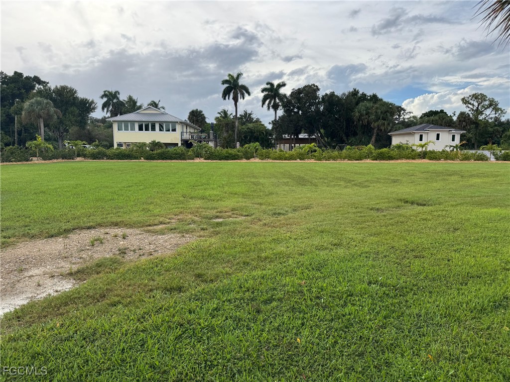 1746 Seafan Circle North Fort Myers, FL 33903 - Photo 3 of 5 a view of building with outdoor space