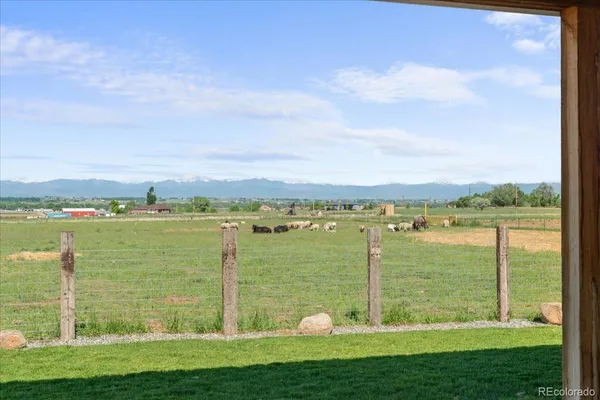 a view of a lake with a big yard