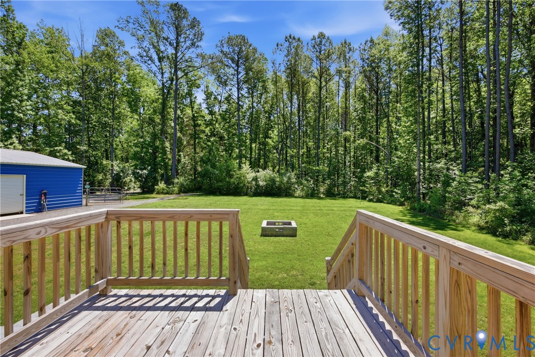 93 Faraway Road Saluda, VA 23149 - Photo 32 of 58 a view of a balcony with wooden floor and fence