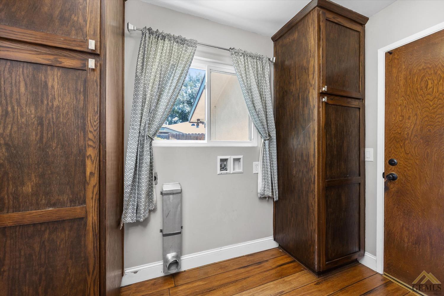 Undisclosed Address Bakersfield, CA 93308 - Photo 27 of 40 a view of front door with wooden floor
