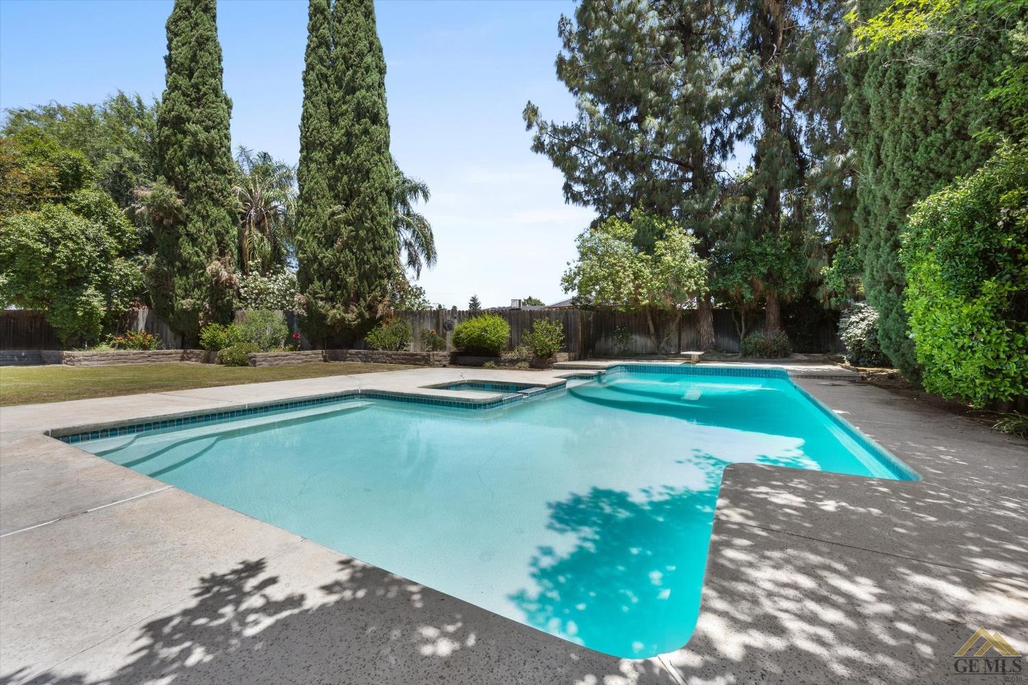 Undisclosed Address Bakersfield, CA 93308 - Photo 29 of 40 a view of a swimming pool with an outdoor space