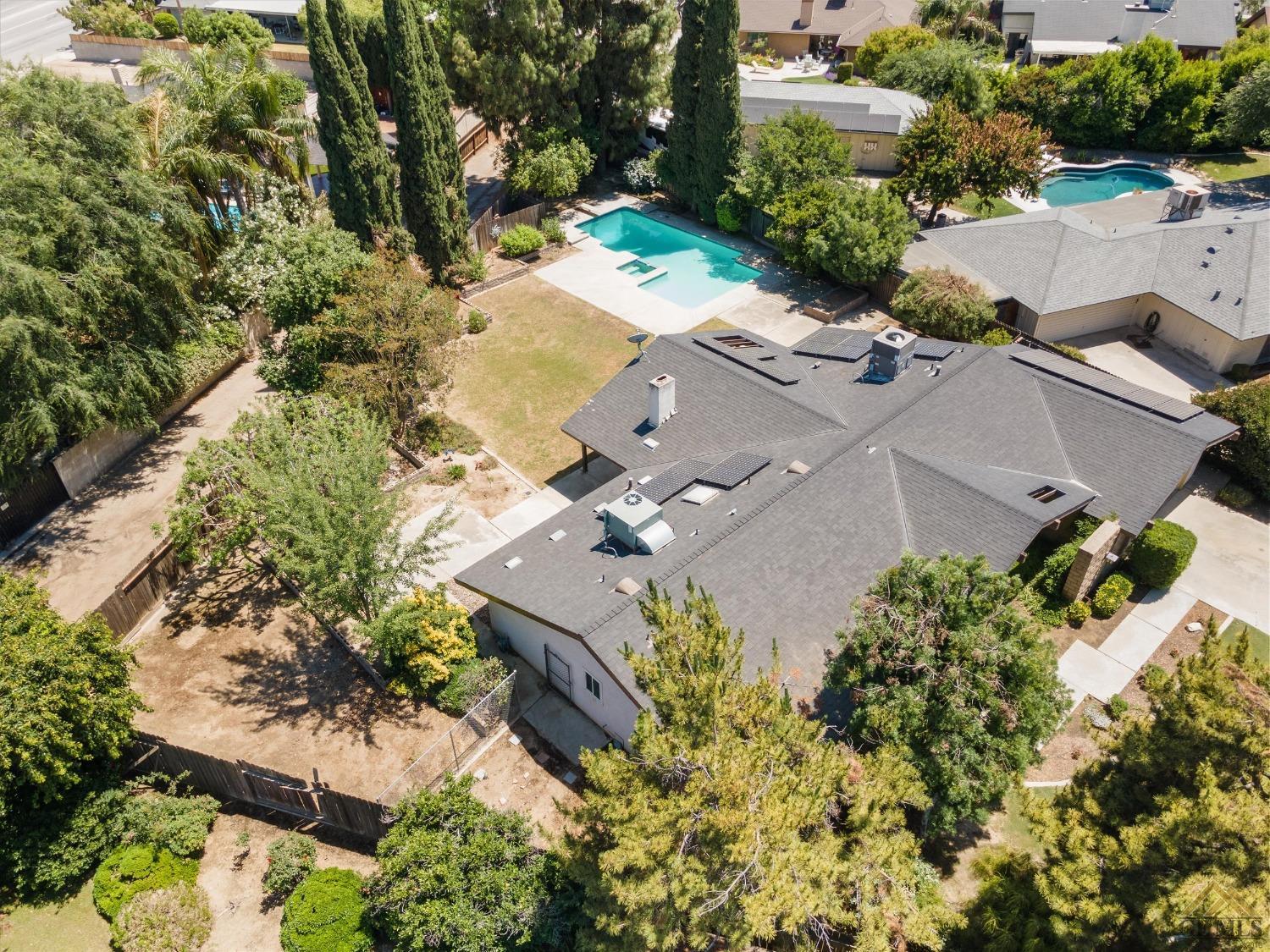 Undisclosed Address Bakersfield, CA 93308 - Photo 36 of 40 an aerial view of a house with a yard