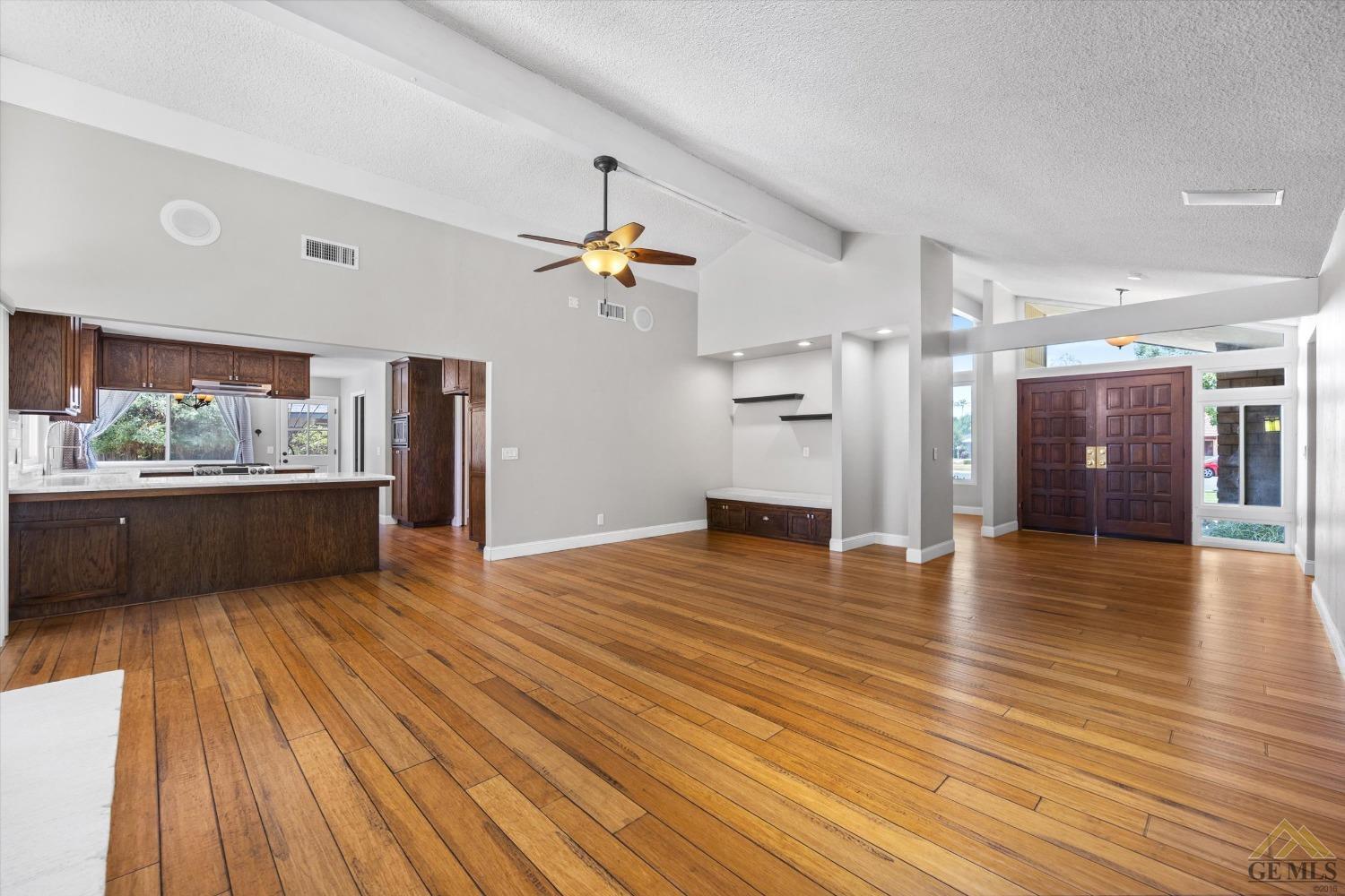 Undisclosed Address Bakersfield, CA 93308 - Photo 9 of 40 a view of a kitchen with a sink and microwave