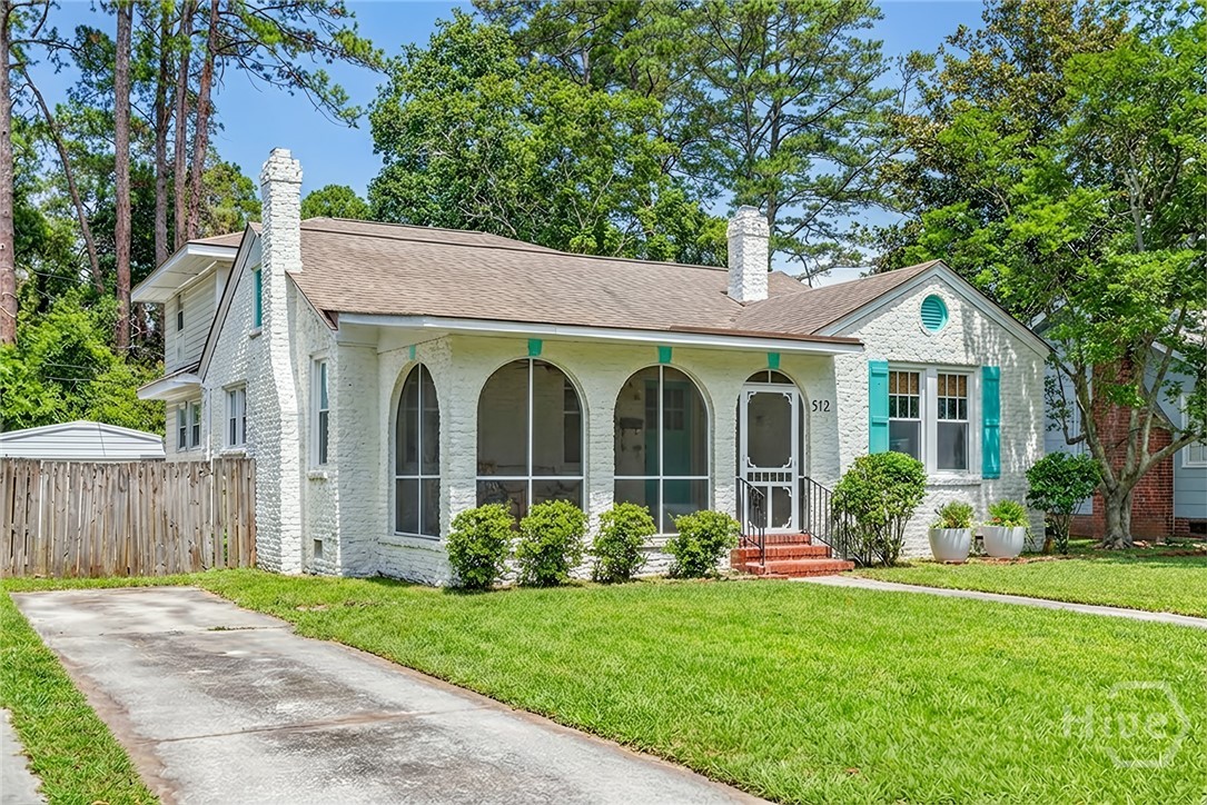 512 East 58th Street Savannah, GA 31405 - Photo 2 of 44 Grass has been artificially enhanced