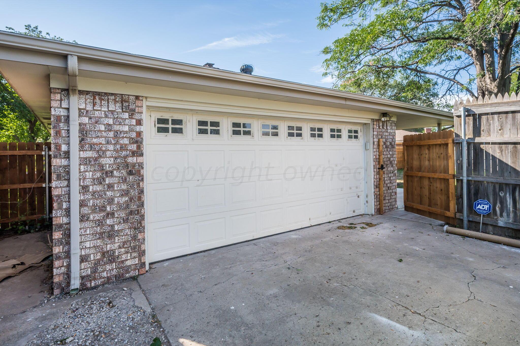 7220 Montague Drive Amarillo, TX 79109 - Photo 26 of 29 a view of a front door of the house