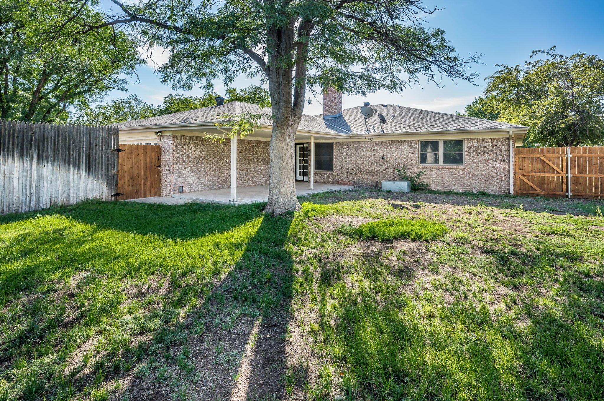 7220 Montague Drive Amarillo, TX 79109 - Photo 28 of 29 a front view of house with yard and green space