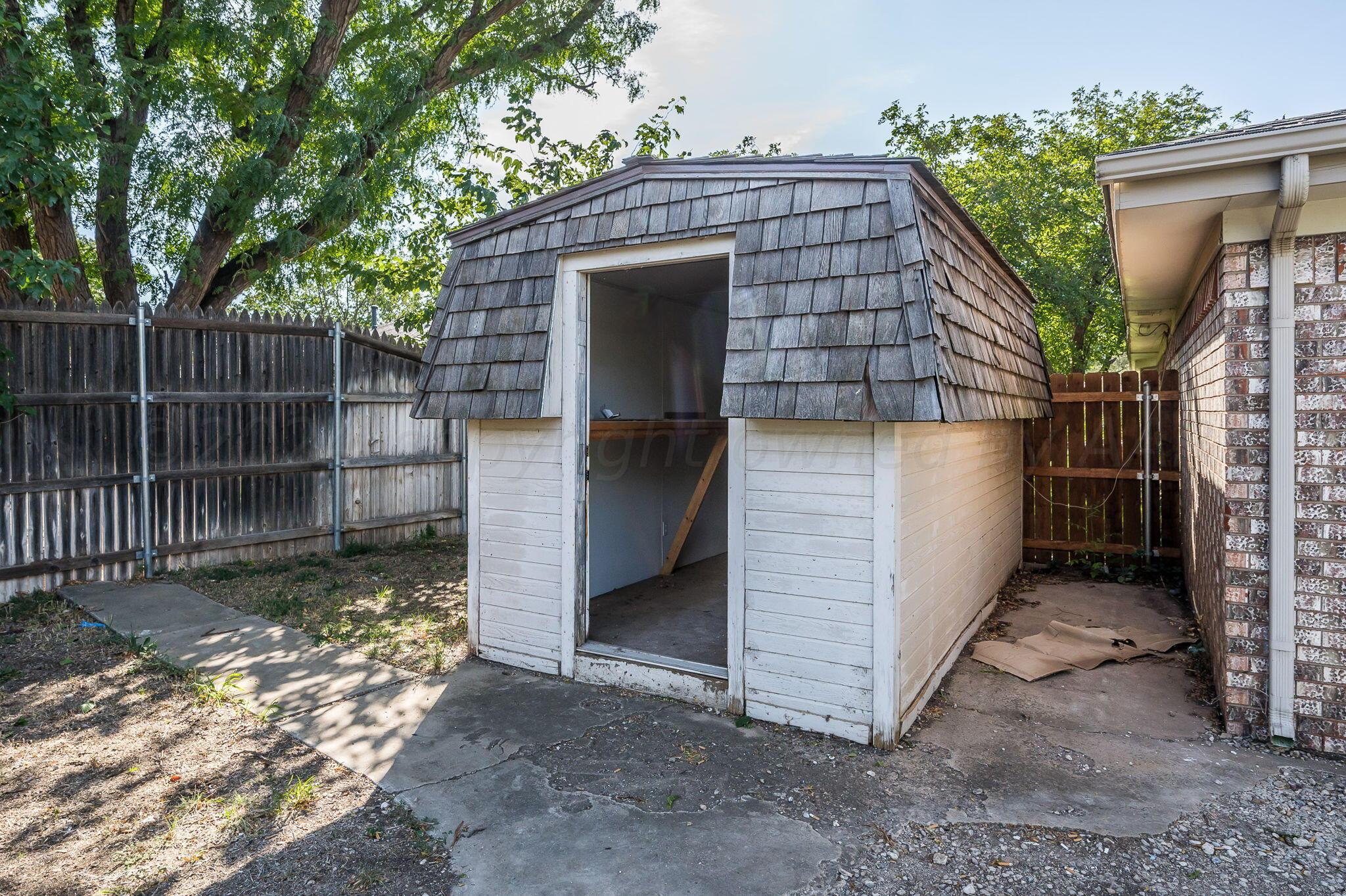 7220 Montague Drive Amarillo, TX 79109 - Photo 29 of 29 a front view of a house with a yard