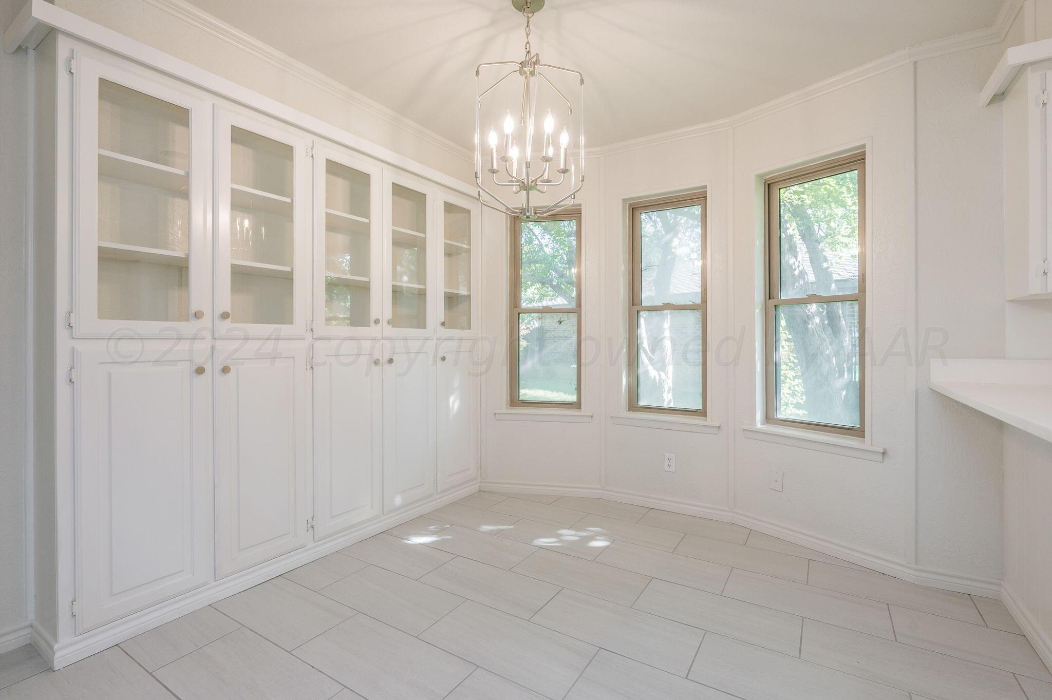 7220 Montague Drive Amarillo, TX 79109 - Photo 7 of 29 a view of an empty room with a window