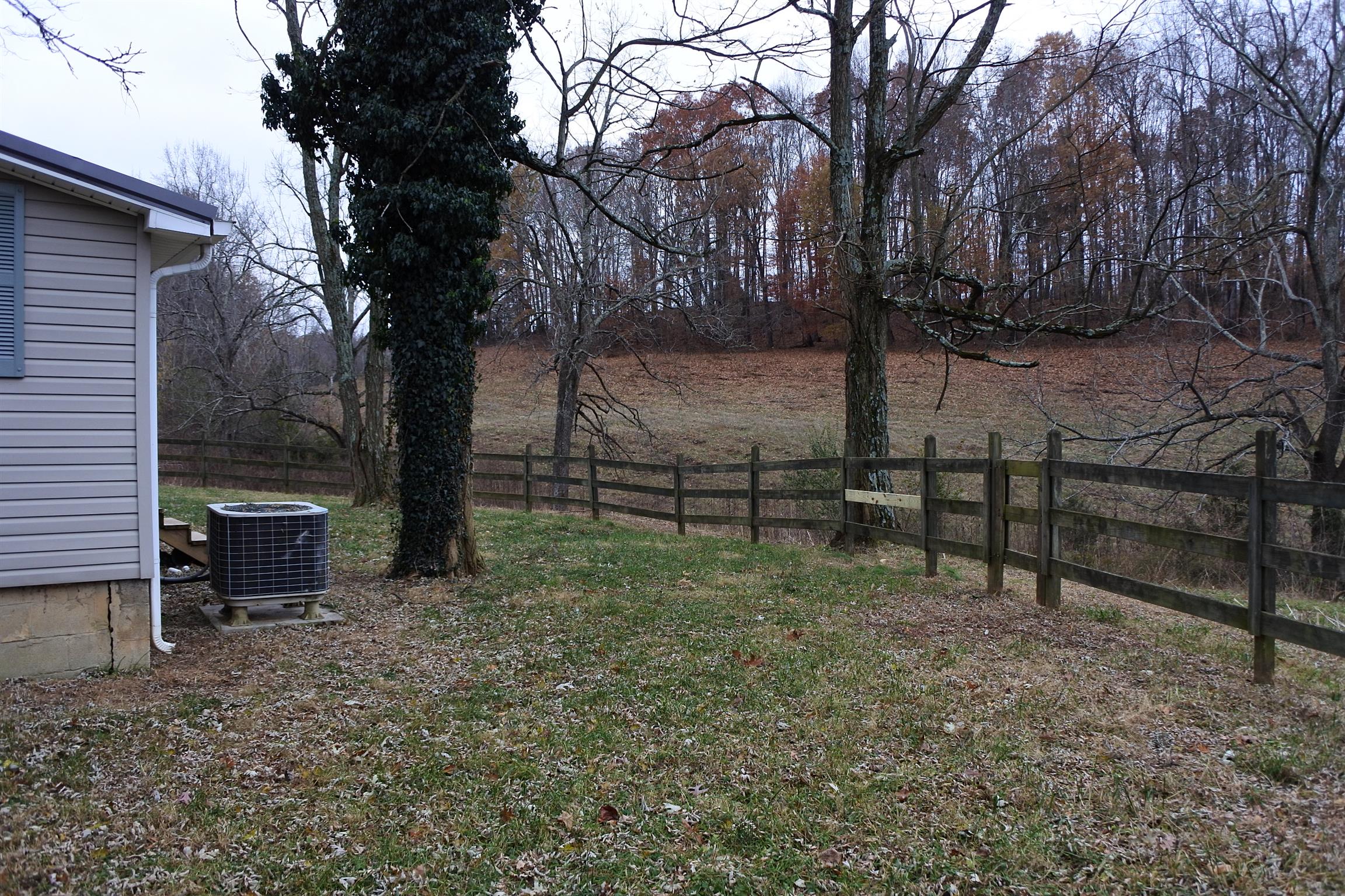 375 Lonesome Valley Road Allons, TN 38541 - Photo 19 of 23 a view of a yard with wooden fence
