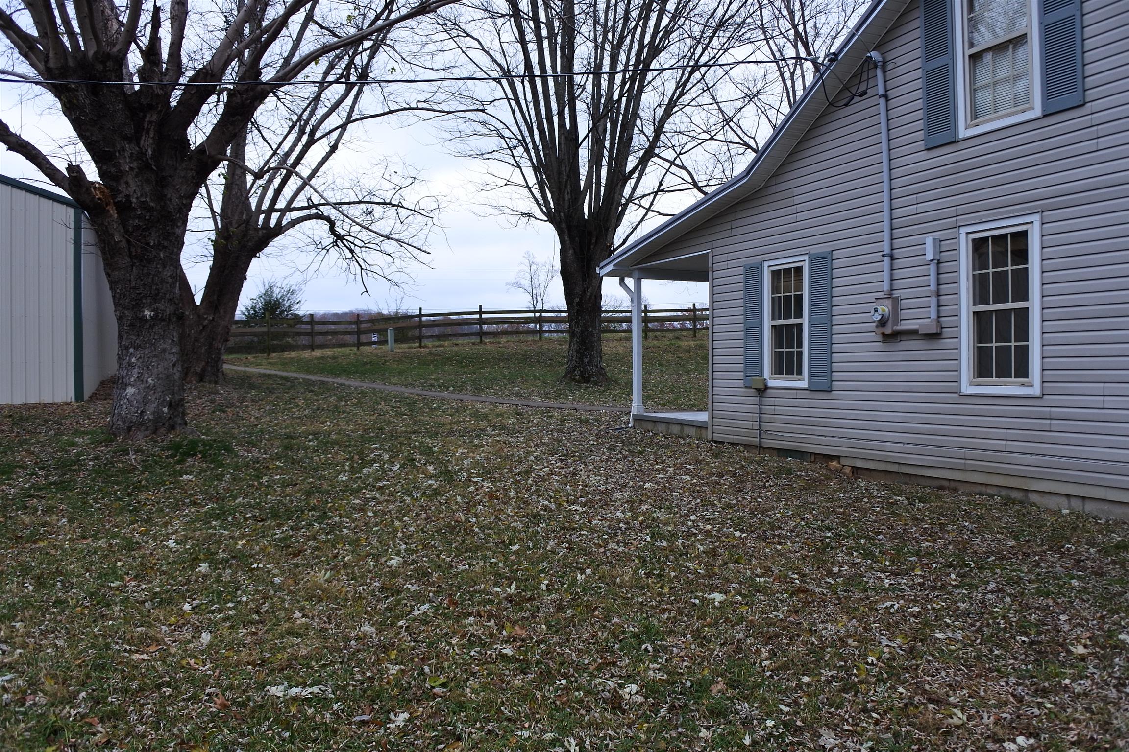 375 Lonesome Valley Road Allons, TN 38541 - Photo 20 of 23 a backyard of a house with lots of green space