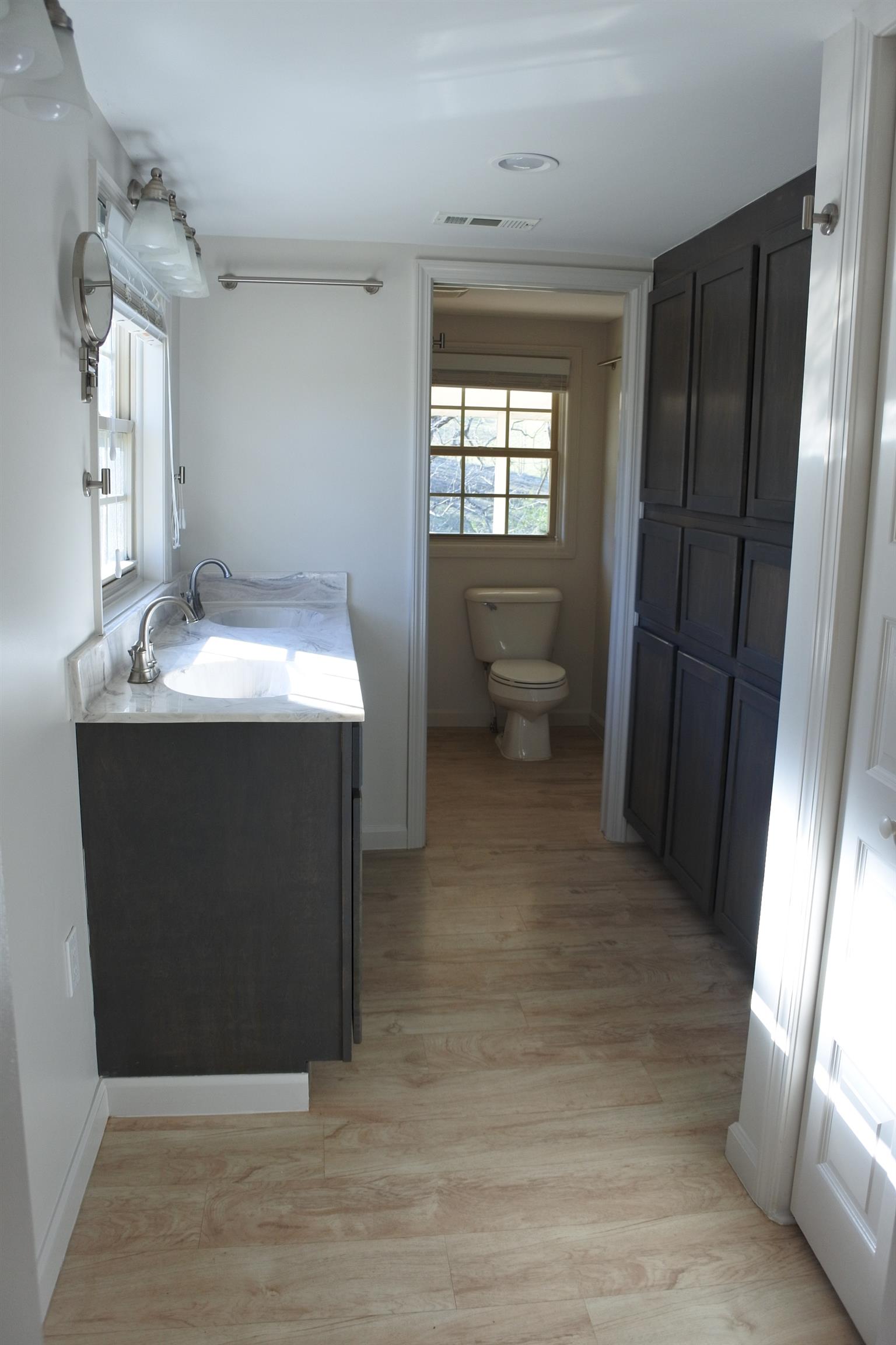 375 Lonesome Valley Road Allons, TN 38541 - Photo 6 of 23 a bathroom with a sink toilet and shower