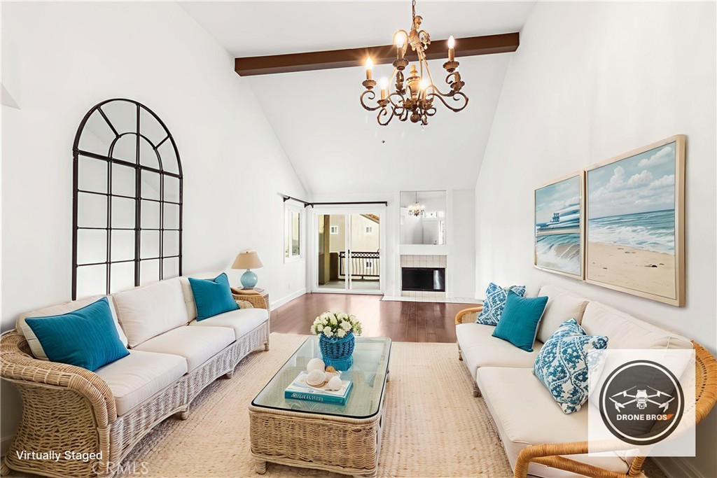 430 Lake Street, Unit 304 Huntington Beach, CA 92648 - Photo 1 of 46 a living room with furniture a table and decor