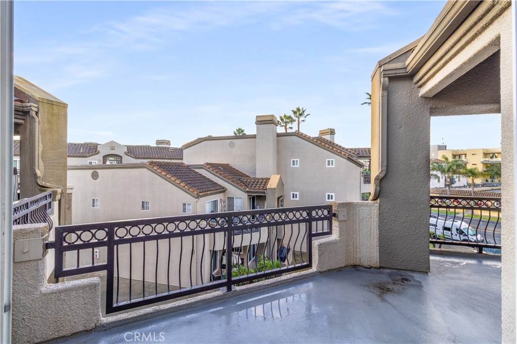 430 Lake Street, Unit 304 Huntington Beach, CA 92648 - Photo 14 of 46 a view of a balcony with city view