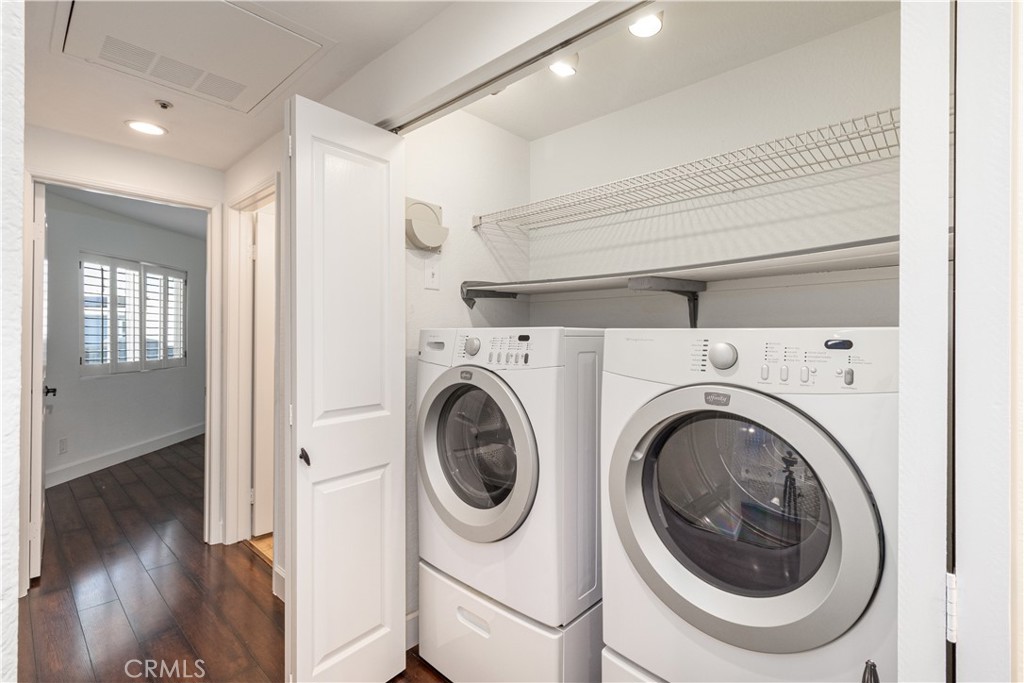 430 Lake Street, Unit 304 Huntington Beach, CA 92648 - Photo 24 of 46 a view of a hallway with washer and dryer
