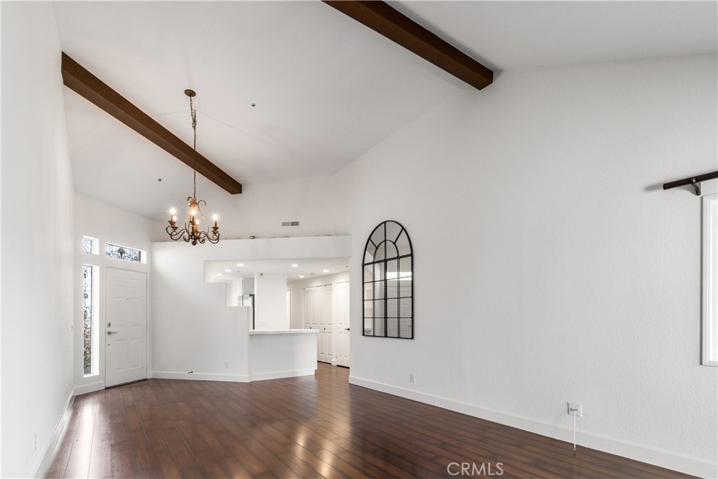 430 Lake Street, Unit 304 Huntington Beach, CA 92648 - Photo 10 of 46 a view of a hallway with entryway