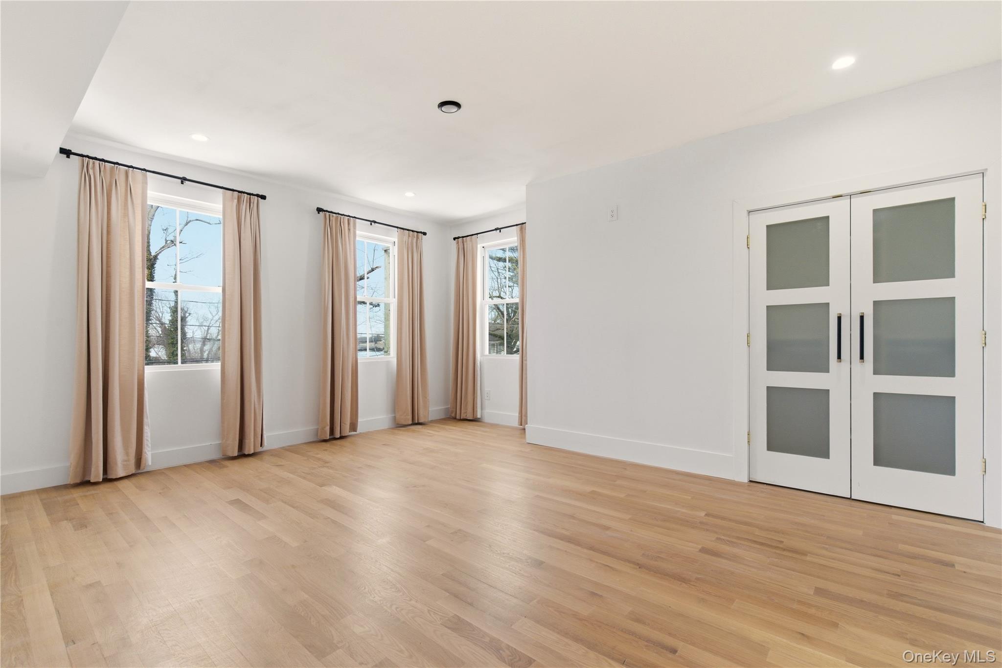 77 Cove Road Oyster Bay, NY 11771 - Photo 27 of 45 Spacious Bedroom with Custom Closet