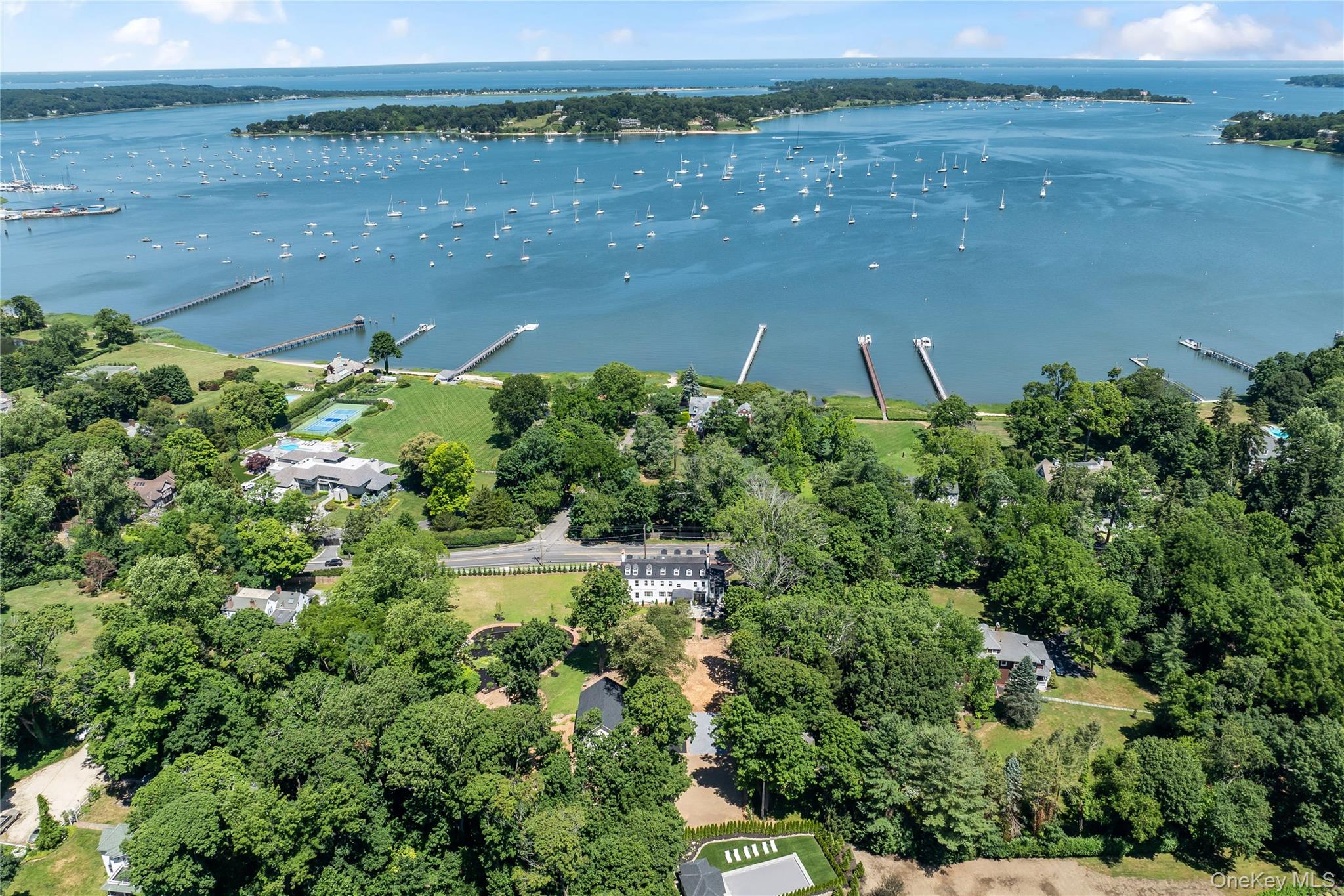 77 Cove Road Oyster Bay, NY 11771 - Photo 29 of 45 an aerial view of a houses with outdoor space and lake view