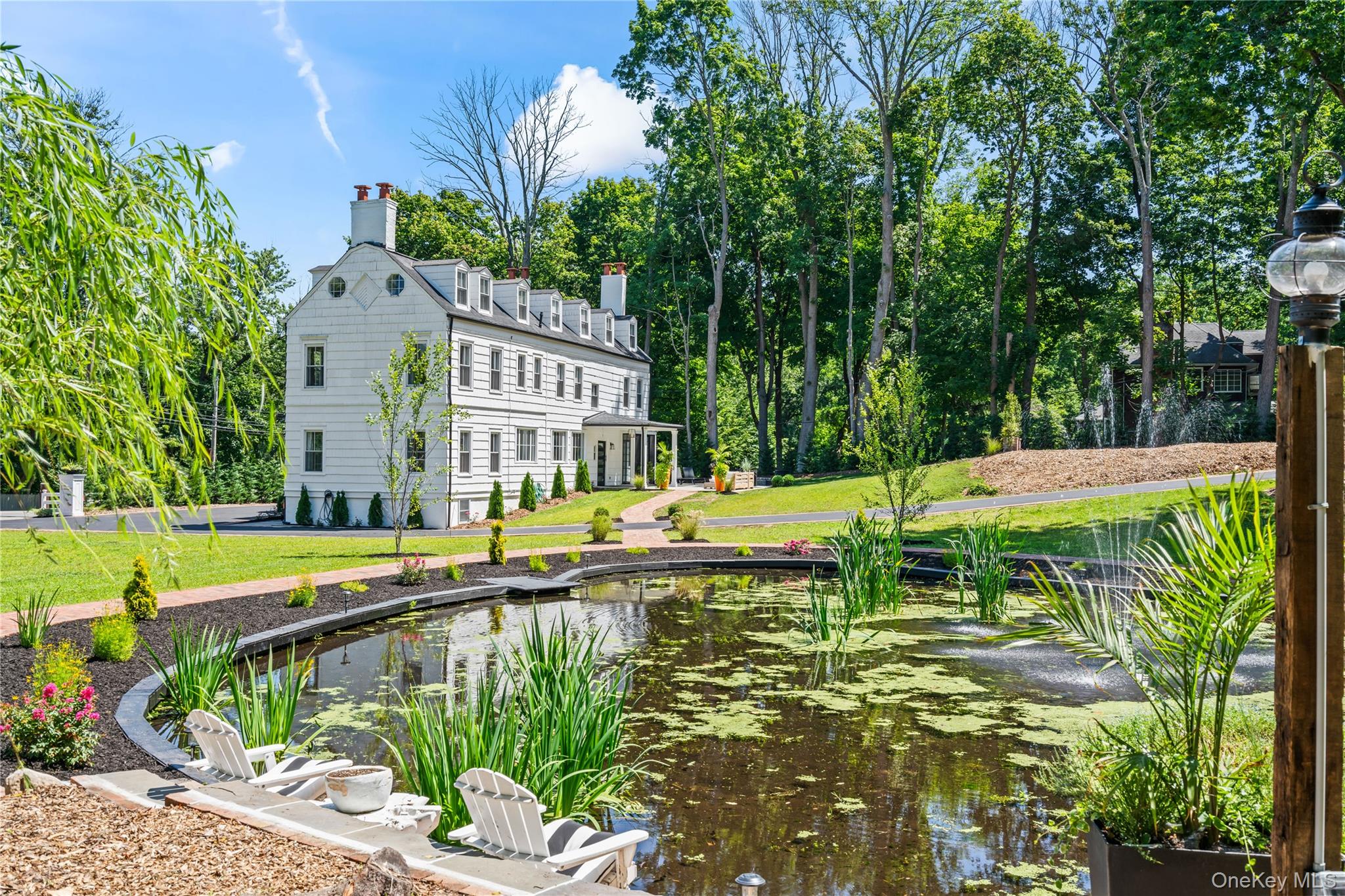 77 Cove Road Oyster Bay, NY 11771 - Photo 34 of 45 Natural Spring-Fed Pond.