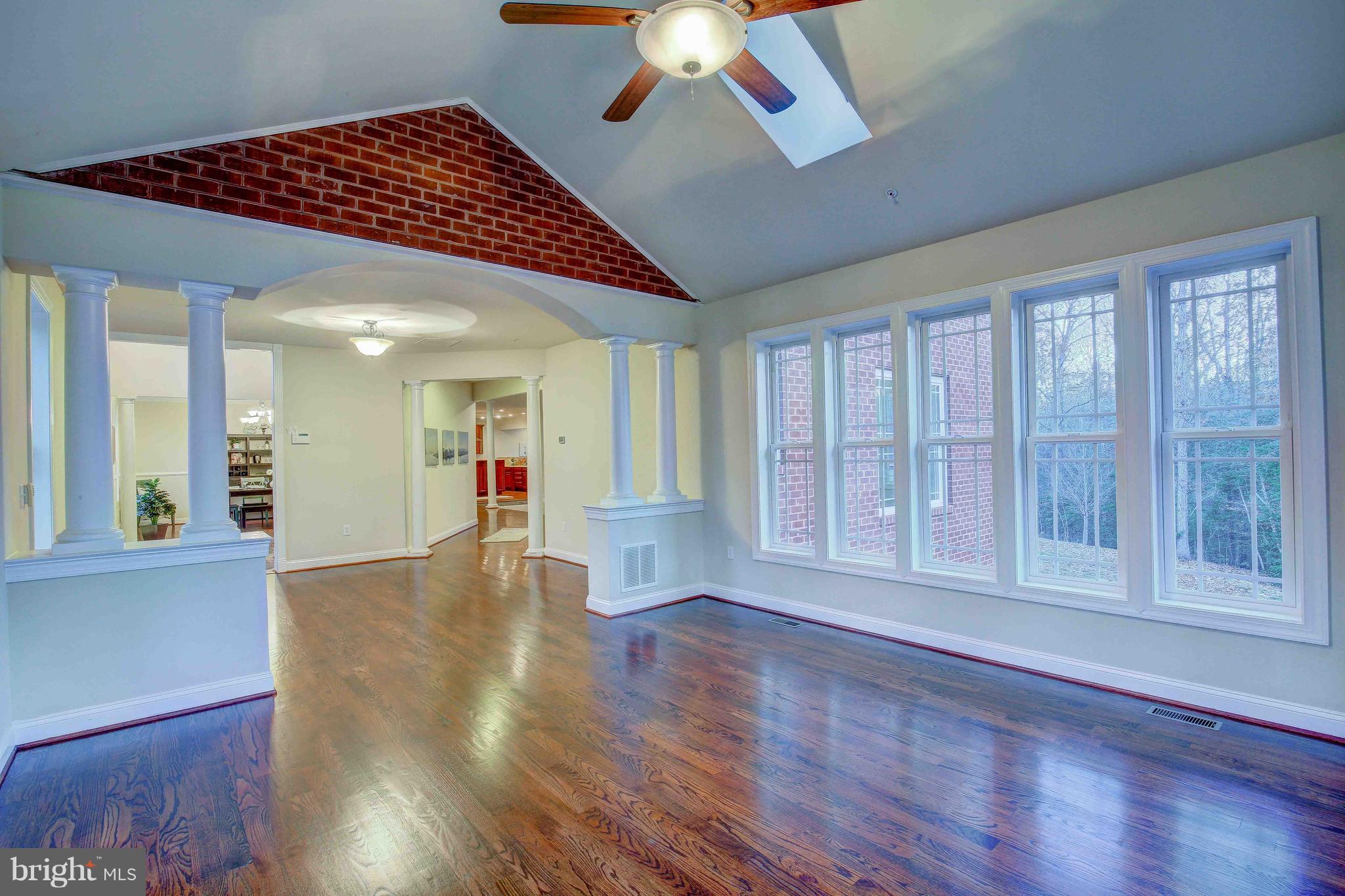 19120 Aquasco Road Brandywine, MD 20613 - Photo 24 of 63 Light Filled Living Room w Brick Design Feature