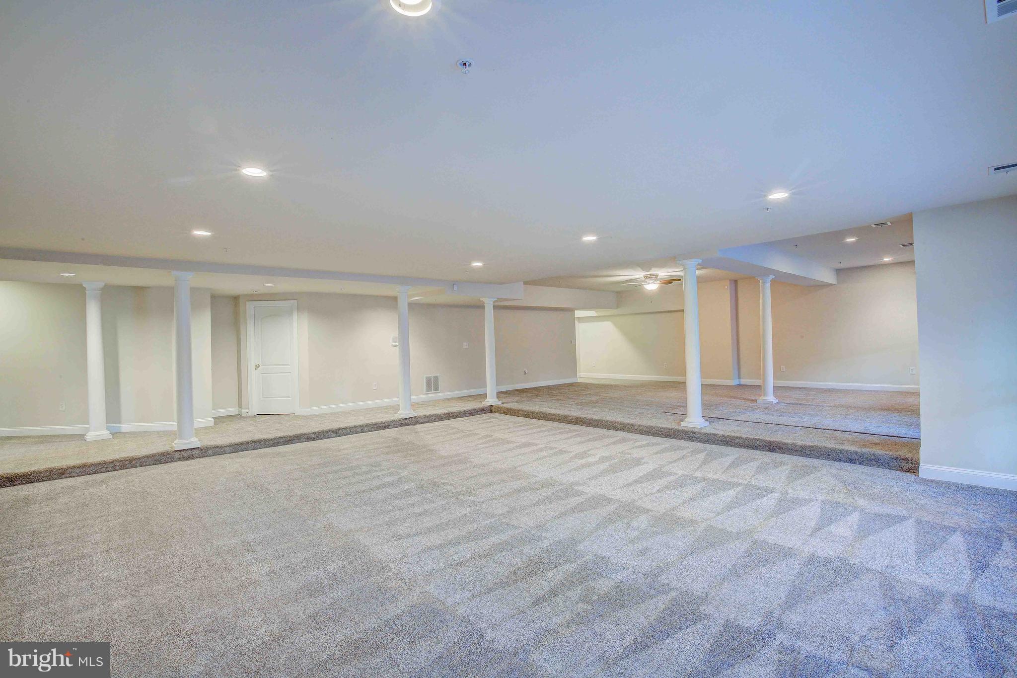 19120 Aquasco Road Brandywine, MD 20613 - Photo 55 of 63 Upscale Basement Features - Columns & New Carpet