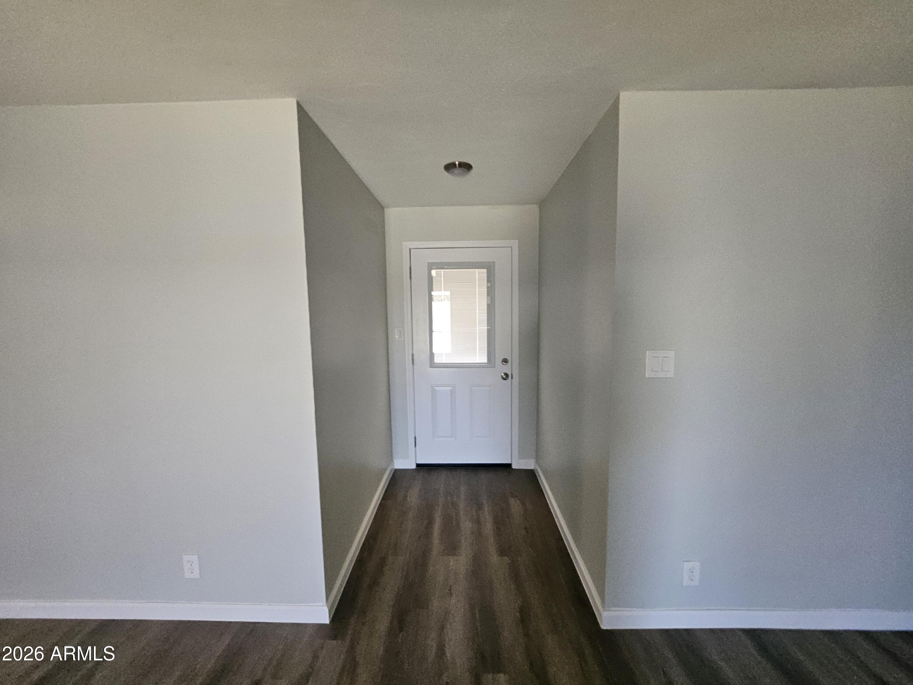 524 West 3rd Place Mesa, AZ 85201 - Photo 8 of 23 a view of a hallway with wooden floor